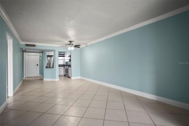 Enjoy all the benefits of Florida living, without the hassle of on Feather Sound Country Club in Florida - for sale on GolfHomes.com, golf home, golf lot