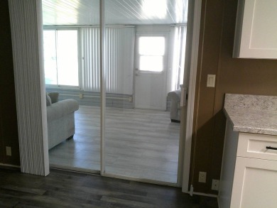 If you're searching for a beautiful, move-in ready home with on Hamptons Golf Club in Florida - for sale on GolfHomes.com, golf home, golf lot
