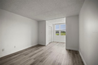 Enjoy all the benefits of Florida living, without the hassle of on Feather Sound Country Club in Florida - for sale on GolfHomes.com, golf home, golf lot