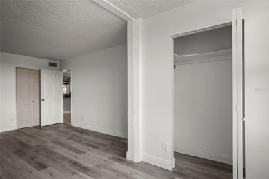 Enjoy all the benefits of Florida living, without the hassle of on Feather Sound Country Club in Florida - for sale on GolfHomes.com, golf home, golf lot