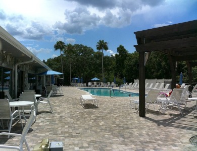 If you're searching for a beautiful, move-in ready home with on Hamptons Golf Club in Florida - for sale on GolfHomes.com, golf home, golf lot
