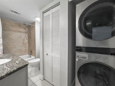 Enjoy all the benefits of Florida living, without the hassle of on Feather Sound Country Club in Florida - for sale on GolfHomes.com, golf home, golf lot