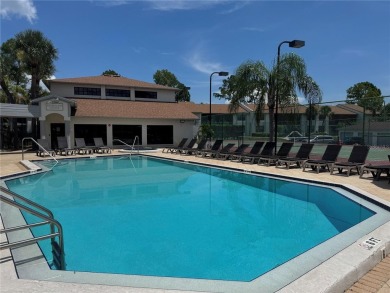 Enjoy all the benefits of Florida living, without the hassle of on Feather Sound Country Club in Florida - for sale on GolfHomes.com, golf home, golf lot