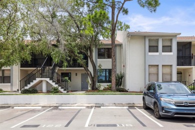 Enjoy all the benefits of Florida living, without the hassle of on Feather Sound Country Club in Florida - for sale on GolfHomes.com, golf home, golf lot