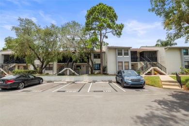 Enjoy all the benefits of Florida living, without the hassle of on Feather Sound Country Club in Florida - for sale on GolfHomes.com, golf home, golf lot