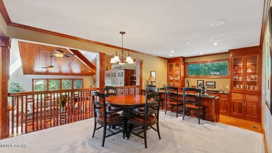 Inspired by the timeless architectural influence of Frank Lloyd on Nevada Country Club in Missouri - for sale on GolfHomes.com, golf home, golf lot