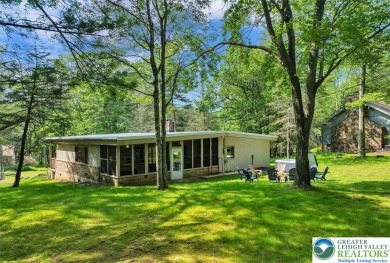 Step into this 3-bedroom, 2-bath Lake Harmony home showcasing on Split Rock Resort and Country Club in Pennsylvania - for sale on GolfHomes.com, golf home, golf lot