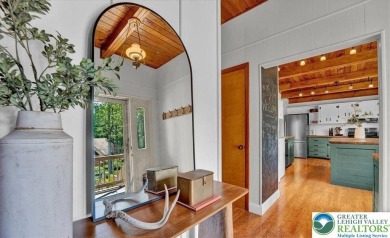 Step into this 3-bedroom, 2-bath Lake Harmony home showcasing on Split Rock Resort and Country Club in Pennsylvania - for sale on GolfHomes.com, golf home, golf lot
