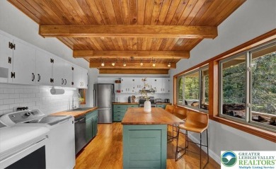 Step into this 3-bedroom, 2-bath Lake Harmony home showcasing on Split Rock Resort and Country Club in Pennsylvania - for sale on GolfHomes.com, golf home, golf lot