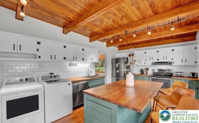 Step into this 3-bedroom, 2-bath Lake Harmony home showcasing on Split Rock Resort and Country Club in Pennsylvania - for sale on GolfHomes.com, golf home, golf lot