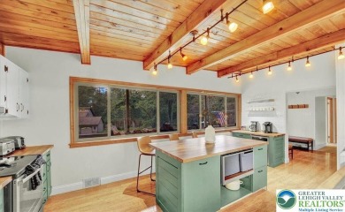 Step into this 3-bedroom, 2-bath Lake Harmony home showcasing on Split Rock Resort and Country Club in Pennsylvania - for sale on GolfHomes.com, golf home, golf lot