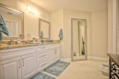 Stunning golf course views, 3 bedroom, 3 full bath home. Primary on Atlantis Golf Club in Florida - for sale on GolfHomes.com, golf home, golf lot