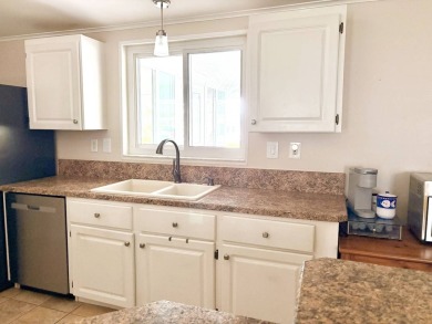 Step into luxury with this stunning 2-bedroom, 2-bathroom Pebble on Crane Lakes Golf and Country Club in Florida - for sale on GolfHomes.com, golf home, golf lot