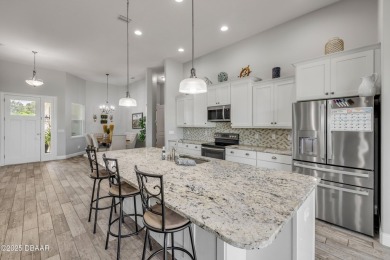 Welcome to 2916 Bella Fore Terrace, a stunning 4-bedroom, 2-bath on Venetian Bay Golf Course in Florida - for sale on GolfHomes.com, golf home, golf lot
