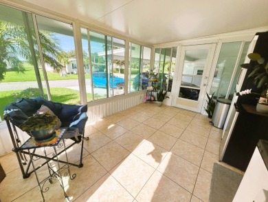 Step into luxury with this stunning 2-bedroom, 2-bathroom Pebble on Crane Lakes Golf and Country Club in Florida - for sale on GolfHomes.com, golf home, golf lot
