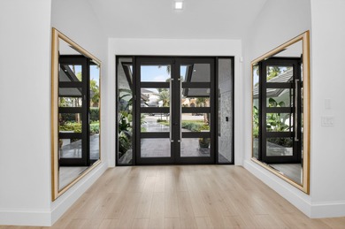 FULLY RENOVATED one-story, 3 bedroom + large den/office home in on St. Andrews Country Club of Boca Raton in Florida - for sale on GolfHomes.com, golf home, golf lot