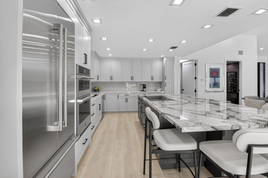 FULLY RENOVATED one-story, 3 bedroom + large den/office home in on St. Andrews Country Club of Boca Raton in Florida - for sale on GolfHomes.com, golf home, golf lot