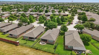 Charming Single Story Glen Cove Model in Frisco Lakes 55+ on Frisco Lakes Golf Course in Texas - for sale on GolfHomes.com, golf home, golf lot