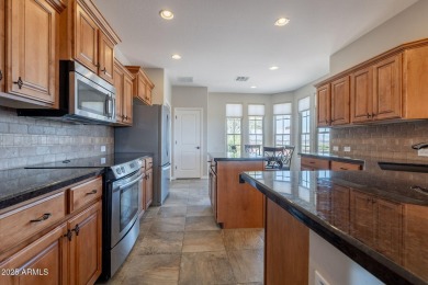 Situated on a spacious corner homesite, this beautiful turn-key on Encanterra Country Club in Arizona - for sale on GolfHomes.com, golf home, golf lot
