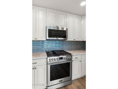 You found it! This renovated home is light & bright with views on McCormick Ranch Golf Club in Arizona - for sale on GolfHomes.com, golf home, golf lot