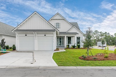 The Ficus Model Home built by Huff Homes, is a popular on Origins Golf Club in Florida - for sale on GolfHomes.com, golf home, golf lot