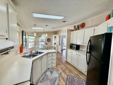 Home is located in Water Oak Country Club Estates in Lady Lake on Water Oak Country Club Estates in Florida - for sale on GolfHomes.com, golf home, golf lot