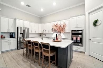 Set on a desirable corner lot in The Place at Corkscrew, this on Old Corkscrew Golf Club in Florida - for sale on GolfHomes.com, golf home, golf lot