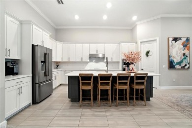 Set on a desirable corner lot in The Place at Corkscrew, this on Old Corkscrew Golf Club in Florida - for sale on GolfHomes.com, golf home, golf lot