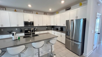 Welcome to your dream vacation home! This exquisite, fully on National Golf Course in Florida - for sale on GolfHomes.com, golf home, golf lot