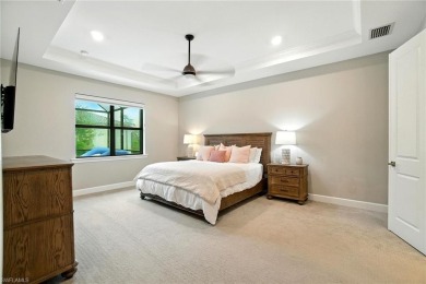 Set on a desirable corner lot in The Place at Corkscrew, this on Old Corkscrew Golf Club in Florida - for sale on GolfHomes.com, golf home, golf lot