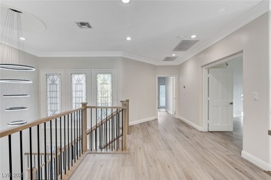 Set behind 24-hour guard gates in Spanish Trail, one of Las on Spanish Trail Golf and Country Club in Nevada - for sale on GolfHomes.com, golf home, golf lot