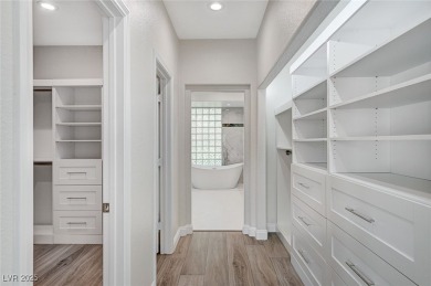 Set behind 24-hour guard gates in Spanish Trail, one of Las on Spanish Trail Golf and Country Club in Nevada - for sale on GolfHomes.com, golf home, golf lot