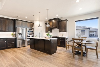 Enjoy life with virtually no power bill in this thoughtfully on Green Spring Country Club in Utah - for sale on GolfHomes.com, golf home, golf lot