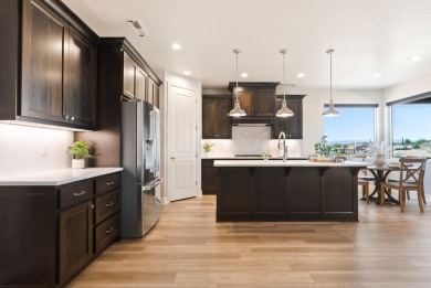 Enjoy life with virtually no power bill in this thoughtfully on Green Spring Country Club in Utah - for sale on GolfHomes.com, golf home, golf lot