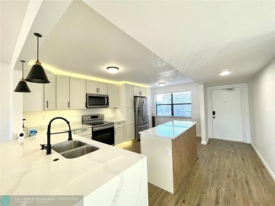 Beautifully Updated Corner Unit. Open Concept Kitchen styled in on Sunrise Lakes Phase IV Golf Course in Florida - for sale on GolfHomes.com, golf home, golf lot