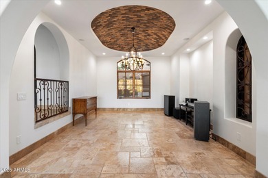 Private yet designed for grand-scale entertaining, this timeless on Eagle Mountain Golf Club in Arizona - for sale on GolfHomes.com, golf home, golf lot