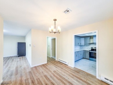 Beautifully renovated 2-bedroom, 1.5-bath ranch with carport on Rossmoor Golf Club in New Jersey - for sale on GolfHomes.com, golf home, golf lot