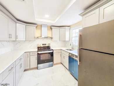 Beautifully renovated 2-bedroom, 1.5-bath ranch with carport on Rossmoor Golf Club in New Jersey - for sale on GolfHomes.com, golf home, golf lot