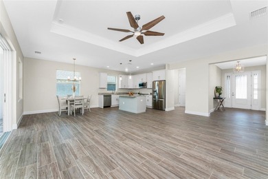 Move Right Into this 2023 Rotonda Heights Pool Home Without the on Rotonda Golf and Country Club The Palms Course in Florida - for sale on GolfHomes.com, golf home, golf lot