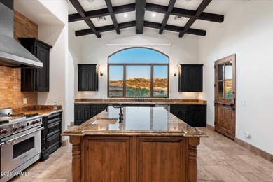 Private yet designed for grand-scale entertaining, this timeless on Eagle Mountain Golf Club in Arizona - for sale on GolfHomes.com, golf home, golf lot