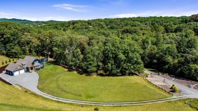 Welcome to a home that feels like a warm embrace--nestled in on Old Toccoa Farm Golf Club in Georgia - for sale on GolfHomes.com, golf home, golf lot
