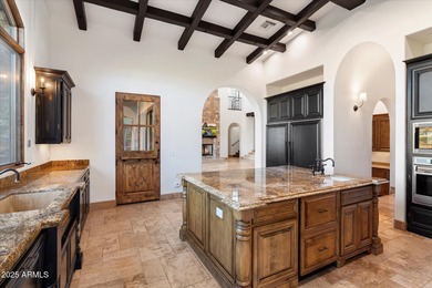 Private yet designed for grand-scale entertaining, this timeless on Eagle Mountain Golf Club in Arizona - for sale on GolfHomes.com, golf home, golf lot