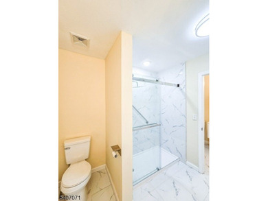 Beautifully renovated 2-bedroom, 1.5-bath ranch with carport on Rossmoor Golf Club in New Jersey - for sale on GolfHomes.com, golf home, golf lot