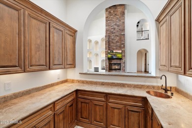 Private yet designed for grand-scale entertaining, this timeless on Eagle Mountain Golf Club in Arizona - for sale on GolfHomes.com, golf home, golf lot