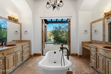 Private yet designed for grand-scale entertaining, this timeless on Eagle Mountain Golf Club in Arizona - for sale on GolfHomes.com, golf home, golf lot