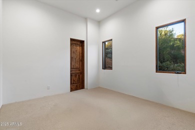 Private yet designed for grand-scale entertaining, this timeless on Eagle Mountain Golf Club in Arizona - for sale on GolfHomes.com, golf home, golf lot