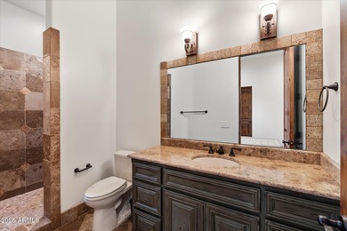 Private yet designed for grand-scale entertaining, this timeless on Eagle Mountain Golf Club in Arizona - for sale on GolfHomes.com, golf home, golf lot