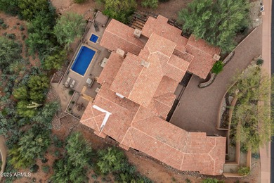 Private yet designed for grand-scale entertaining, this timeless on Eagle Mountain Golf Club in Arizona - for sale on GolfHomes.com, golf home, golf lot