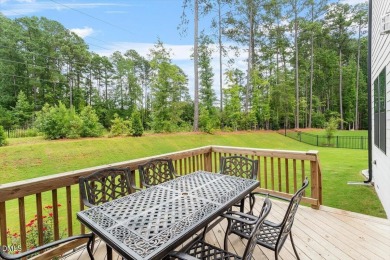 This beautifully designed and meticulously maintained on Hasentree Club in North Carolina - for sale on GolfHomes.com, golf home, golf lot