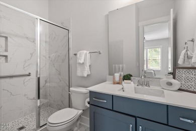 This beautifully designed and meticulously maintained on Hasentree Club in North Carolina - for sale on GolfHomes.com, golf home, golf lot